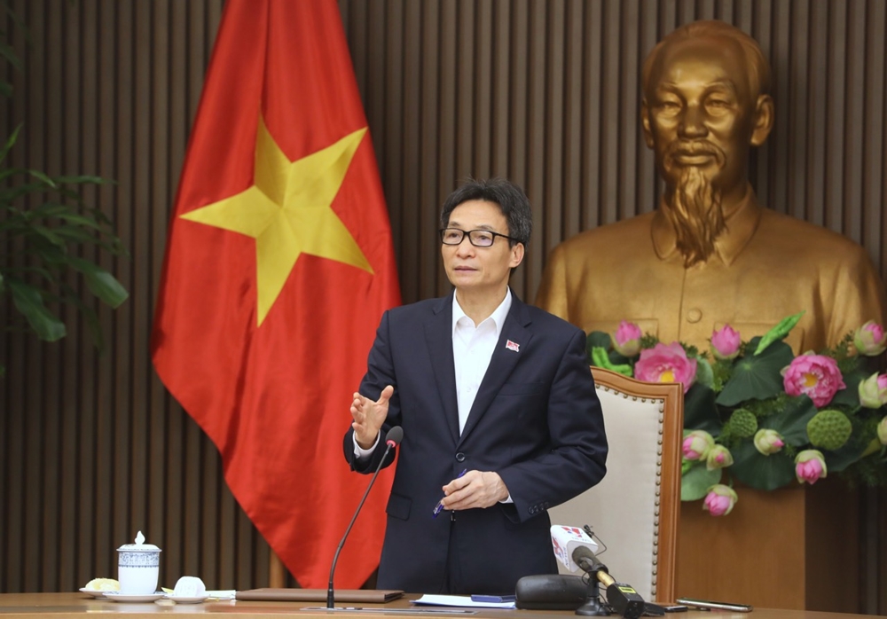 Phó thủ tướng Vũ Đức Đam tại cuộc họp của Thường trực Ban Chỉ đạo Quốc gia phòng, chống dịch Covid-19, trưa ngày 28-1. Ảnh: Đình Nam.